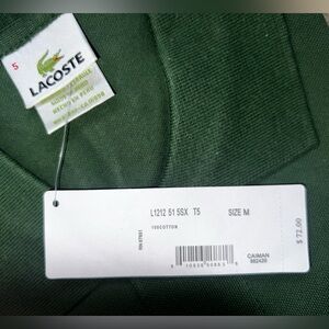 Lacoste polo shirt medium 
New with tags never worn, forest green
